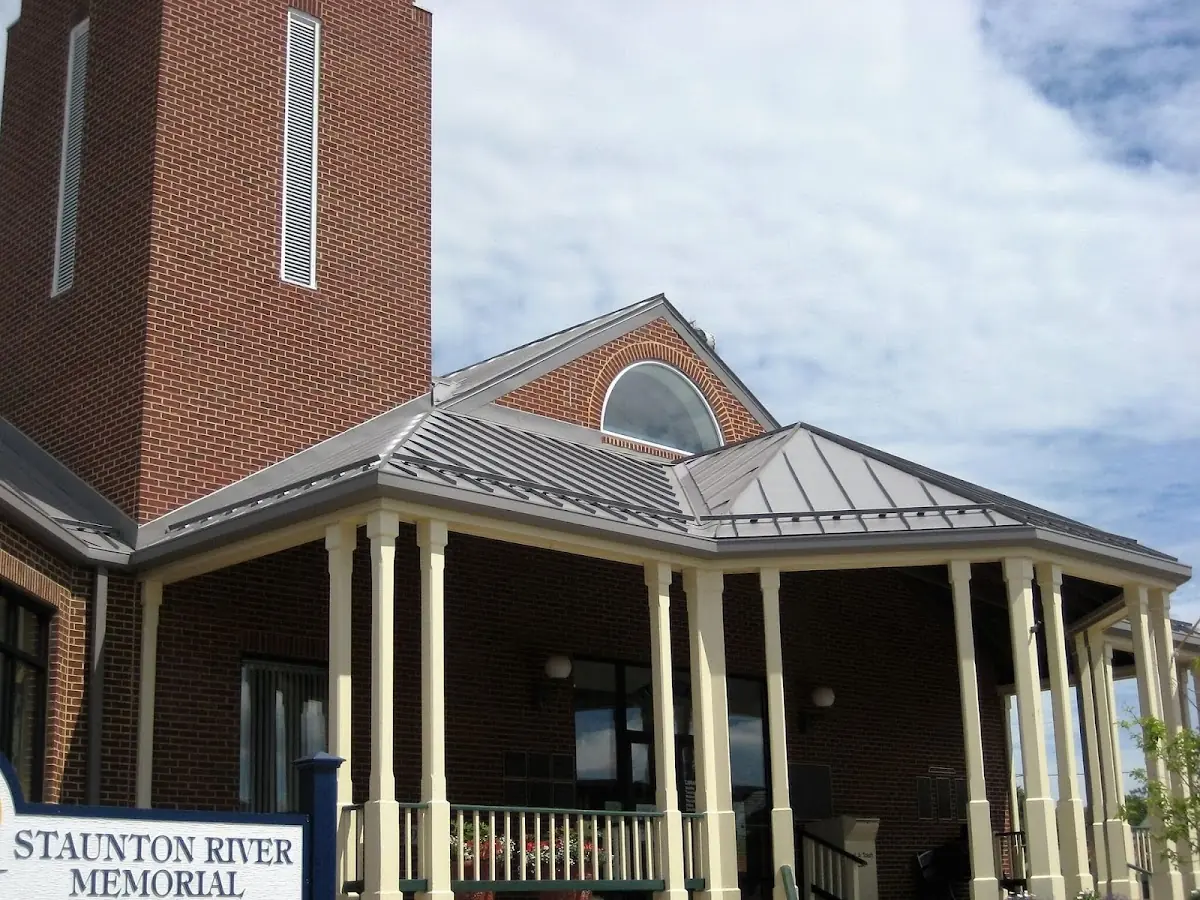 Skilled roofing craftsmen working on a residential roof in Houma